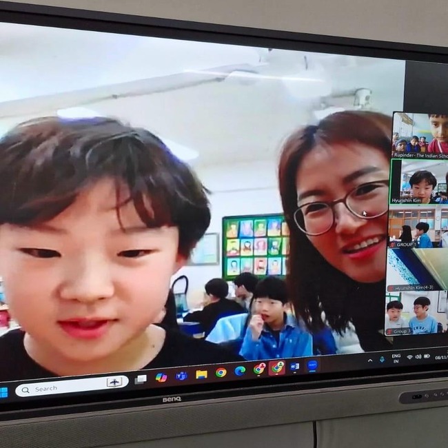 Class IIC engages with peers in a South Korea school